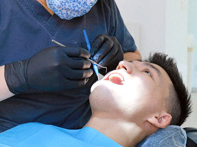 Young man visiting dentist